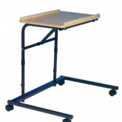 Height adjustable over armchair table with beech effect top and castors.
