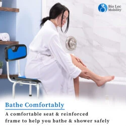 Woman in a bathrobe sitting on a shower chair next to a bathtub.