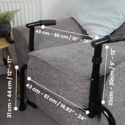 Adjustable sofa stand assist attached to a grey sofa with measurement labels.
