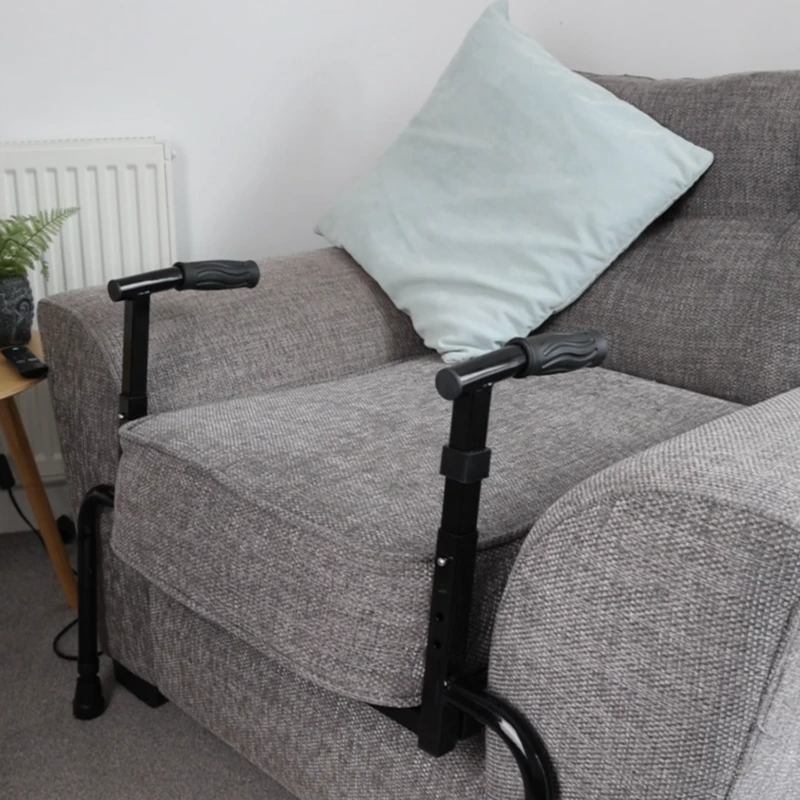 Adjustable sofa stand assist attached to a grey sofa.