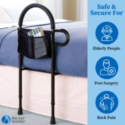 Bed assist rail attached to a bed with a storage pouch holding a book.
