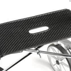 Close-up of the Let's Fly Rollator seat with textured surface.