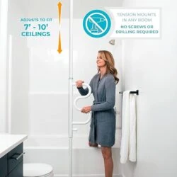 Woman using a white Stander Security Pole & Curve Grab Bar in a bathroom.