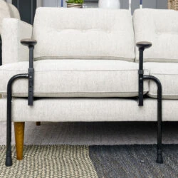 EZ Stand N Go stand assist installed on a sofa.