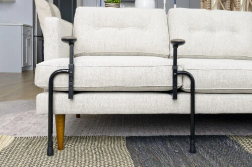 EZ Stand N Go stand assist installed on a sofa.