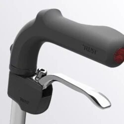Close-up of Trust Rollator handle with brake lever.
