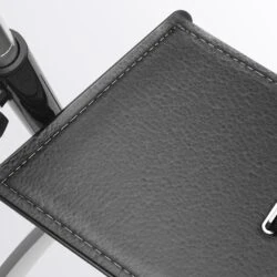 Close-up view of a leatherette seat on a rollator.