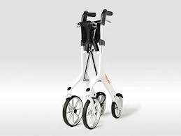 Folded white Let's Fly Rollator with four wheels and a black bag.