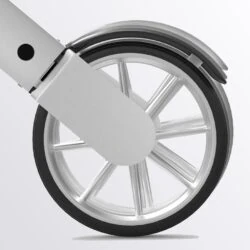 Close-up view of a large wheel on the Lets Go Out Rollator.