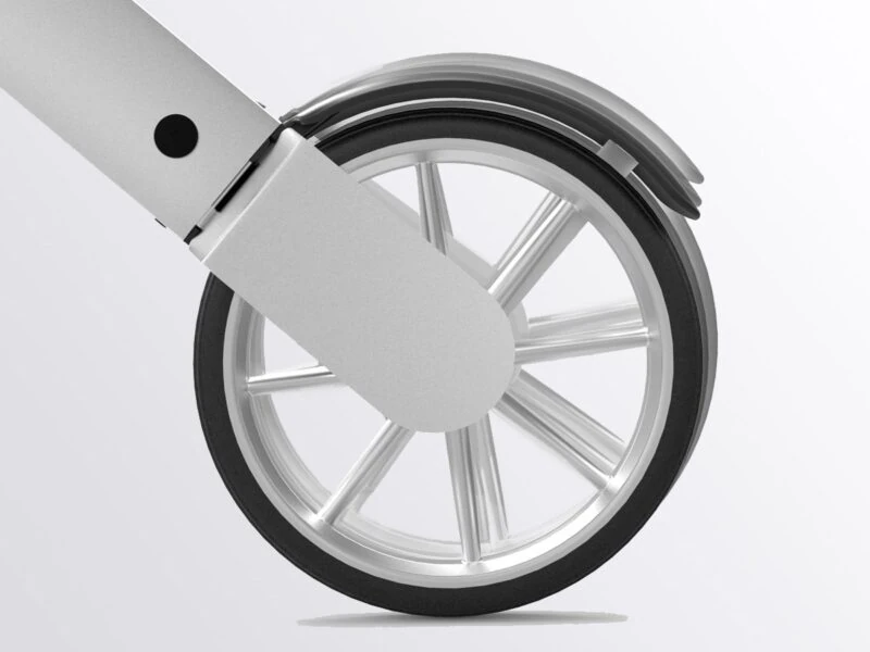 Close-up view of a large wheel on the Lets Go Out Rollator.