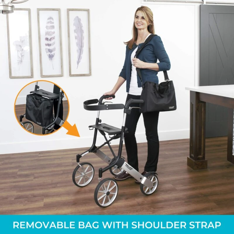 Woman using a Trust rollator with big wheels indoors.