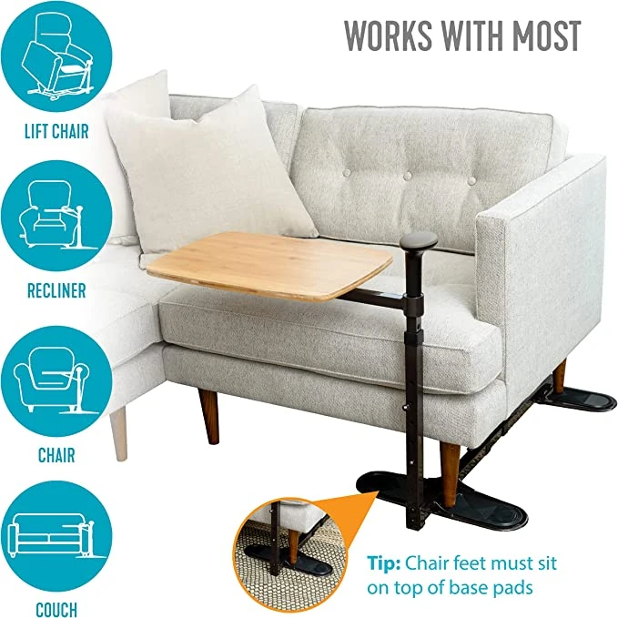 Swivel table attached to a sofa with adjustable base and wooden tray.
