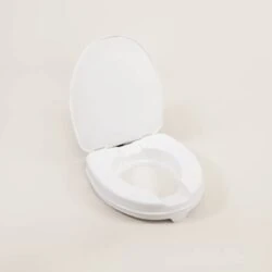 White toilet raiser seat with an open lid on a neutral background.