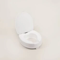 White elevated toilet seat with lid in open position.