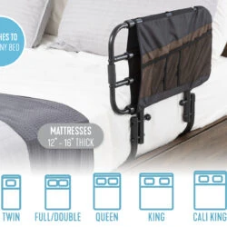 Bed rail with organizer pouch attached to a bed.