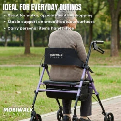 Person sitting on a MobiWalk Classic Rollator in a park.