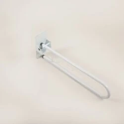 Folding bath rail mounted on a wall, shown in folded position.