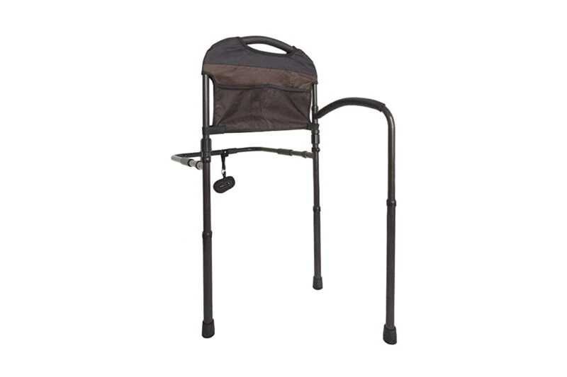 Mobility bed rail with a swing-out arm and non-slip grip handle.