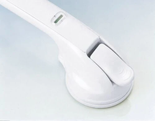 Close-up of a white mobility handle with suction cup base.