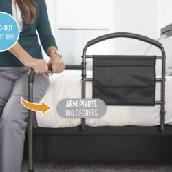 Person using a bed rail with a swing-out mobility arm.