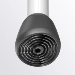 Close-up view of a black rubber foot on a bath stool leg.