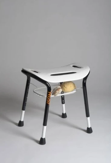 White bath stool with black legs and a metal wire basket underneath.