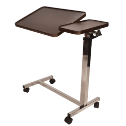 Over chair table with twin tops and swivel castors.