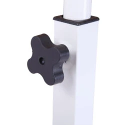Close-up of the adjustable height knob on the overbed table.