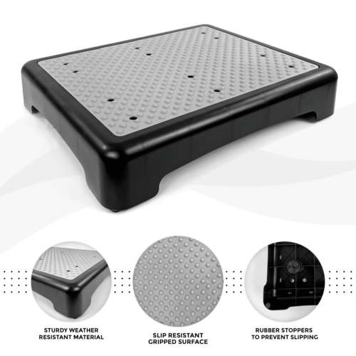 Black and gray outdoor half step with a textured non-slip surface.