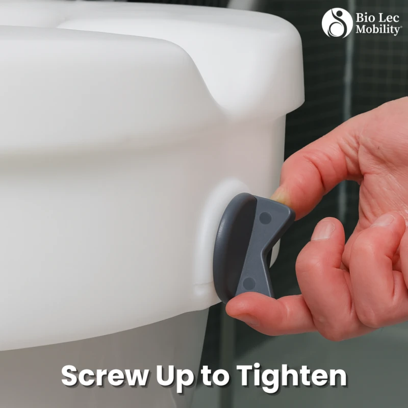 Close-up of hand adjusting screw on a raised toilet seat.