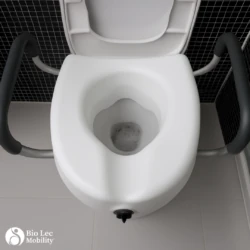 Raised toilet seat with adjustable handles installed on a toilet.