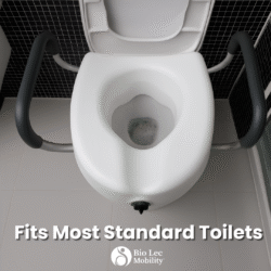 Raised toilet seat with handles installed on a toilet.