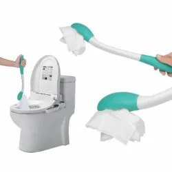 Bottom wiper aid being used near a toilet.