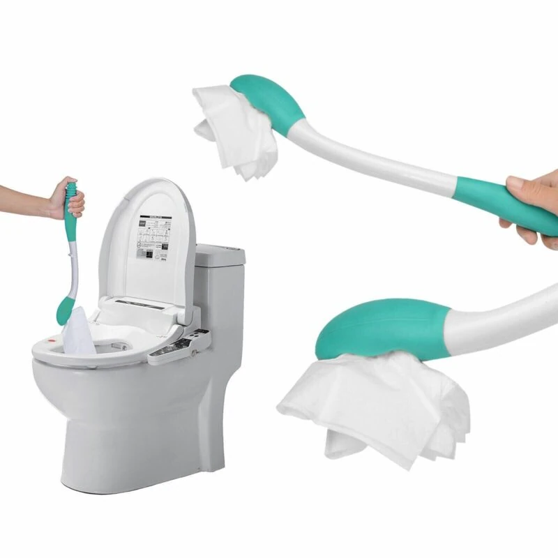 Bottom wiper aid being used near a toilet.