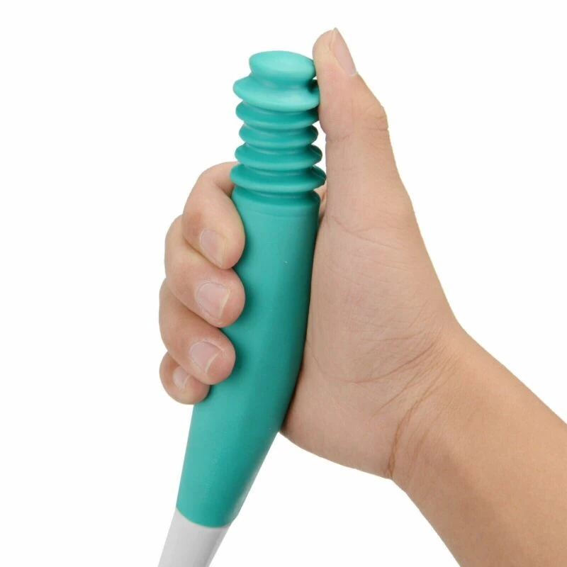 Hand gripping the teal handle of a bottom wiper aid.