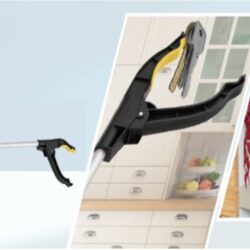 Long reach grabber tool picking up keys and reaching a shelf.