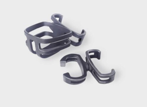 Two black crutch holders on a light background.
