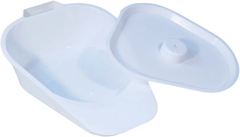 White slipper bedpan with a removable lid.