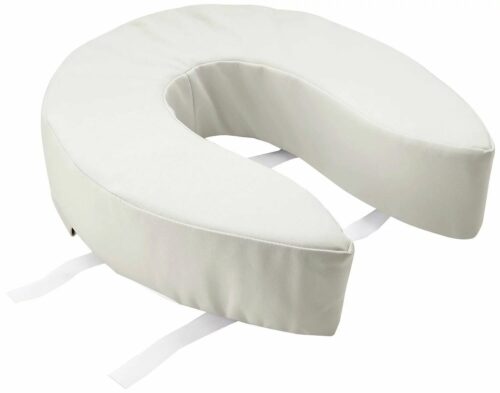 Cushioned padded toilet seat with velcro straps for secure attachment.