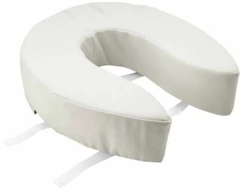 Cushioned padded toilet seat with velcro straps for secure attachment.