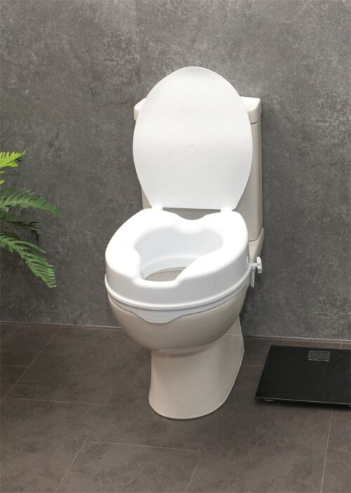 White elevated toilet seat with lid on a standard toilet.