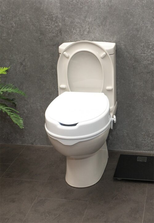 Elevated toilet seat with lid installed on a toilet.