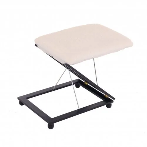 Collapsible foot stool with a padded wool-effect cushion and non-slip feet.