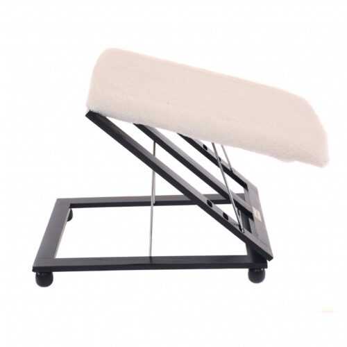Side view of a collapsible foot stool with a padded cushion.