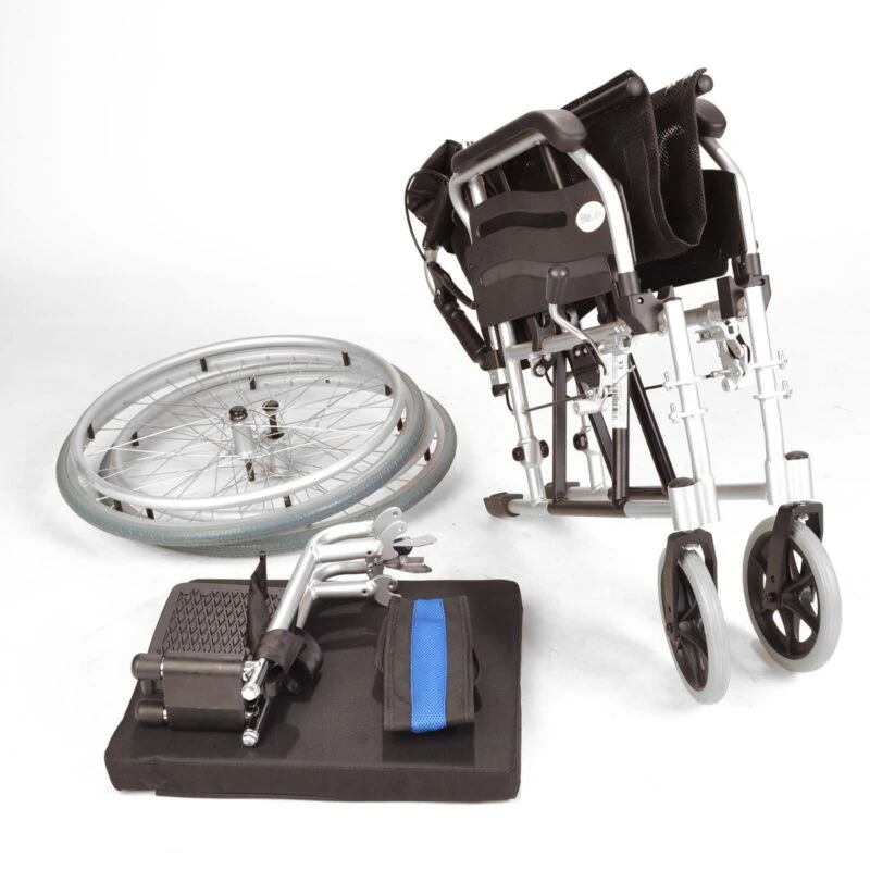 Folded wheelchair with detached wheels and accessories on a white background.