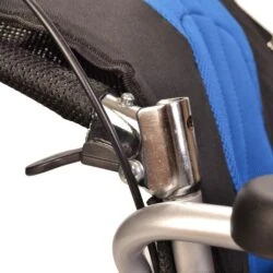 Close-up of a wheelchair hand brake mechanism.
