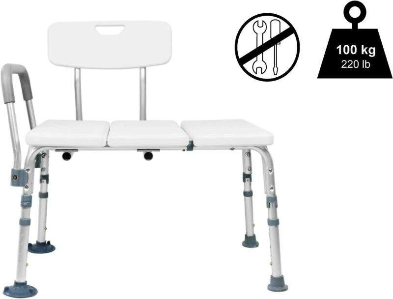 Adjustable bath transfer bench with a padded seat and backrest.