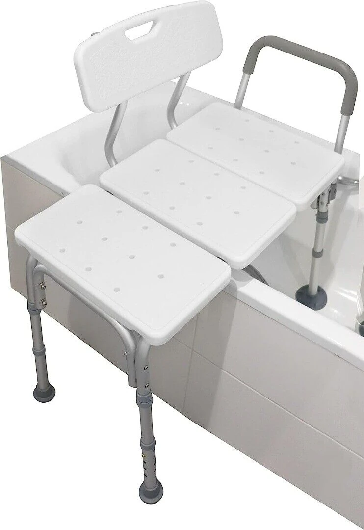 White adjustable bath transfer bench with padded seat and backrest.
