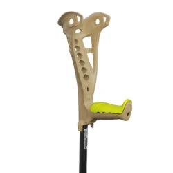 Beige forearm crutch with a yellow grip and black shaft.