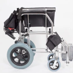Side view of a folded lightweight travel wheelchair with blue wheels.